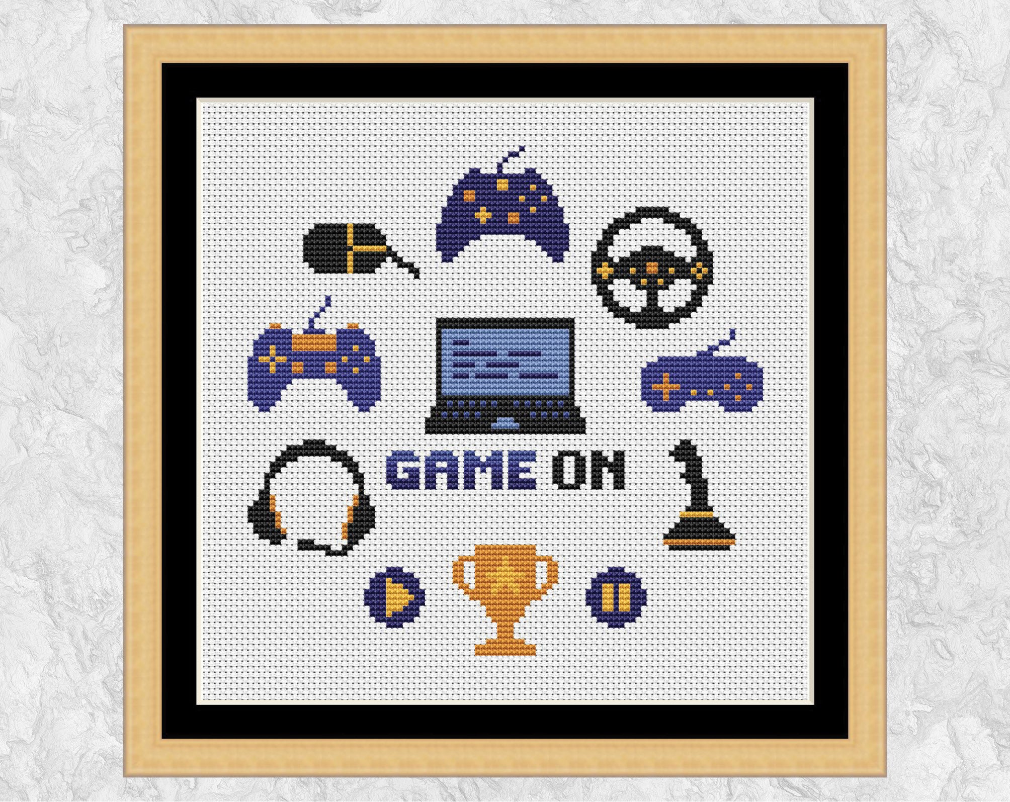 Game On computer games cross stitch pattern. Shown in frame.