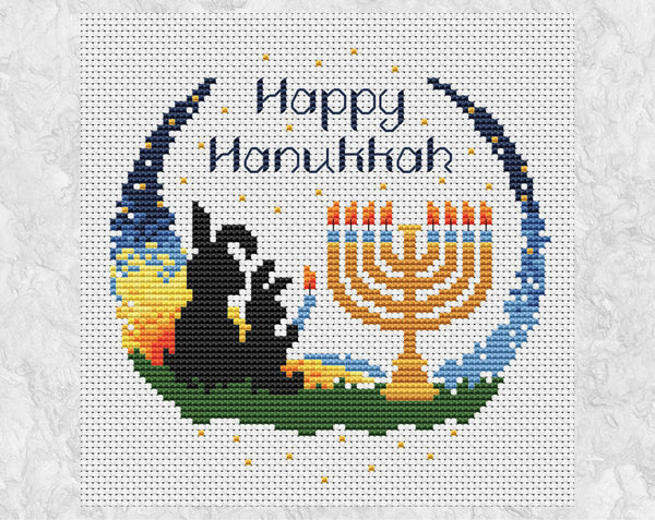 Happy Hanukkah Bunnies cross stitch pattern. Two bunnies lighting a menorah at sunset with the words Happy Hanukkah. Shown without frame.