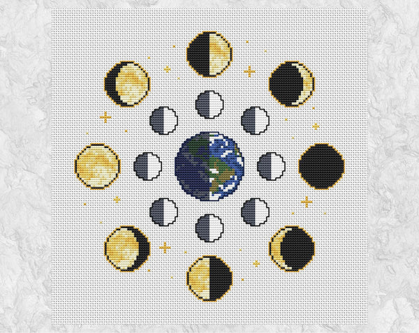 Moon Phases cross stitch pattern on white fabric. Shown without frame.