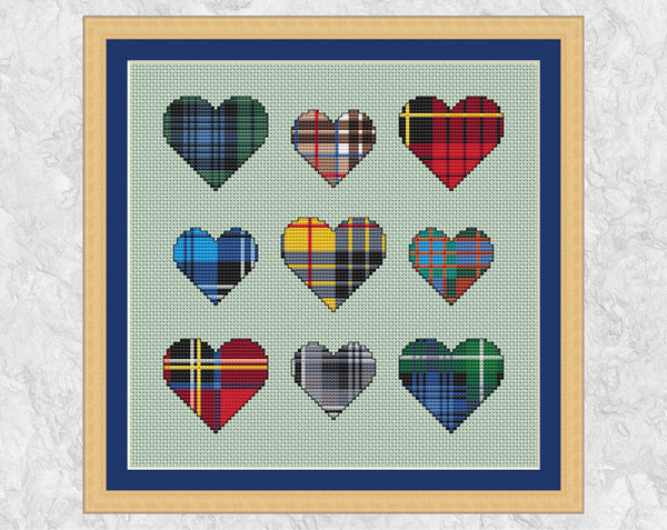 Nine Tartan Hearts cross stitch pattern. Mini hearts filled with different Scottish tartan patterns. Shown with frame.