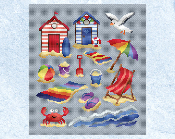 Beach Days cross stitch pattern - fun colourful design featuring beach huts, seagull, parasol, beach towels, spades, buckets, beach ball, deckchair, flipflops, crab, sand and waves. Shown without frame.