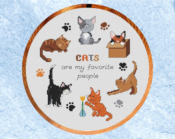 Cat cross stitch pattern - six different coloured cats in a hoop with the words 'CATS are my favourite people'. US version in hoop.