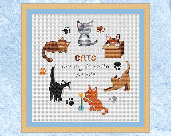 Cat cross stitch pattern - six different coloured cats in a hoop with the words 'CATS are my favourite people'. US version in frame.