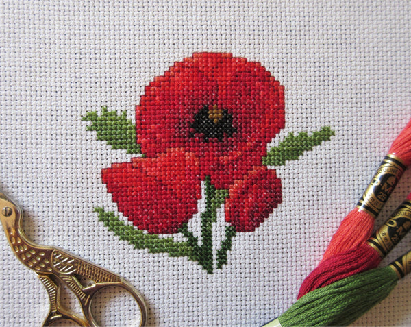 Poppy Flowers cross stitch pattern - stitched piece with props
