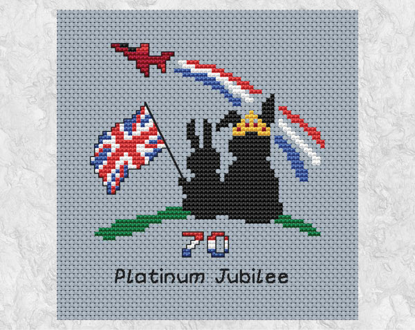 Platinum Jubilee cross stitch pattern. Two bunnies watching with a union flag watching a flypast. Shown without frame.