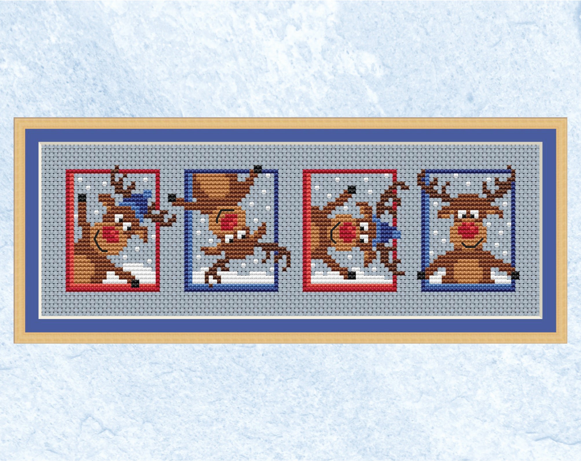 Set of Reindeer cross stitch pattern. Fun mini designs of Christmas cartoon reindeers. Shown with frame.