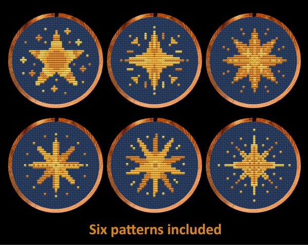 Six mini Christmas stars cross stitch patterns in shades of gold - shown in three inch hoops