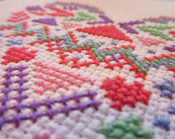 Geometric Heart cross stitch pattern in pastel colours - close up of stitching