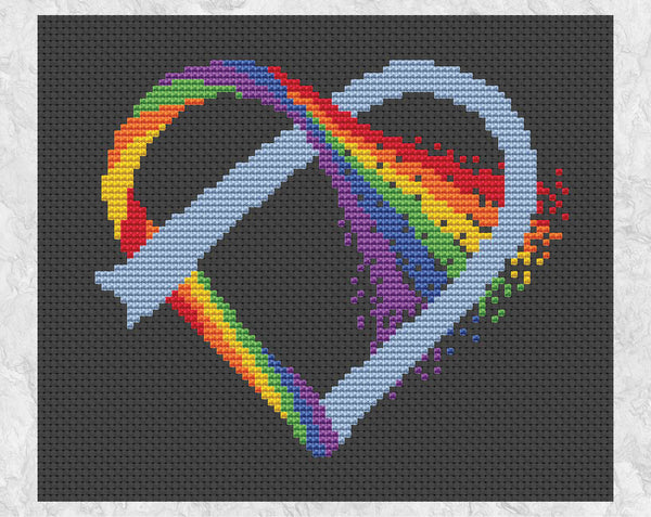 Knotted Rainbow Heart cross stitch pattern on black fabric, without frame