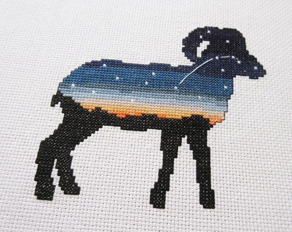 Aries cross stitch pattern - Zodiac at Home Collection. Angled view of stitched piece.