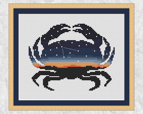Cross stitch pattern of a crab silhouette filled with the zodiac constellation of Cancer against an evening sky. With frame.