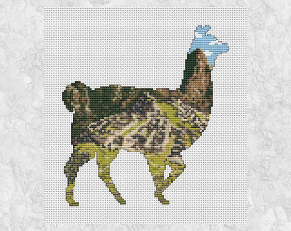 Cross stitch pattern PDF of the silhouette of a llama, filled with a scene of the world famous ancient city of Machu Picchu, set dramatically amongst Peruvian mountains. Shown without frame.