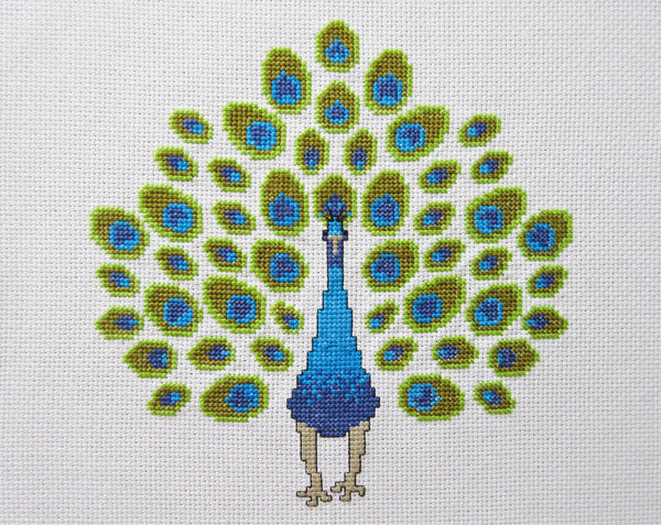 Peacock cross stitch pattern - stitched piece without props