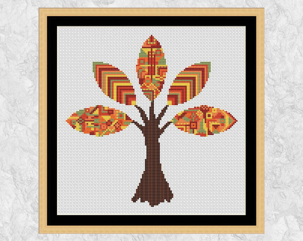 Patterned Autumn Tree cross stitch pattern - fall forest design. Shown with frame.
