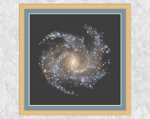 Galaxy NGC 5468 - Astronomy cross stitch pattern - in frame on black fabric