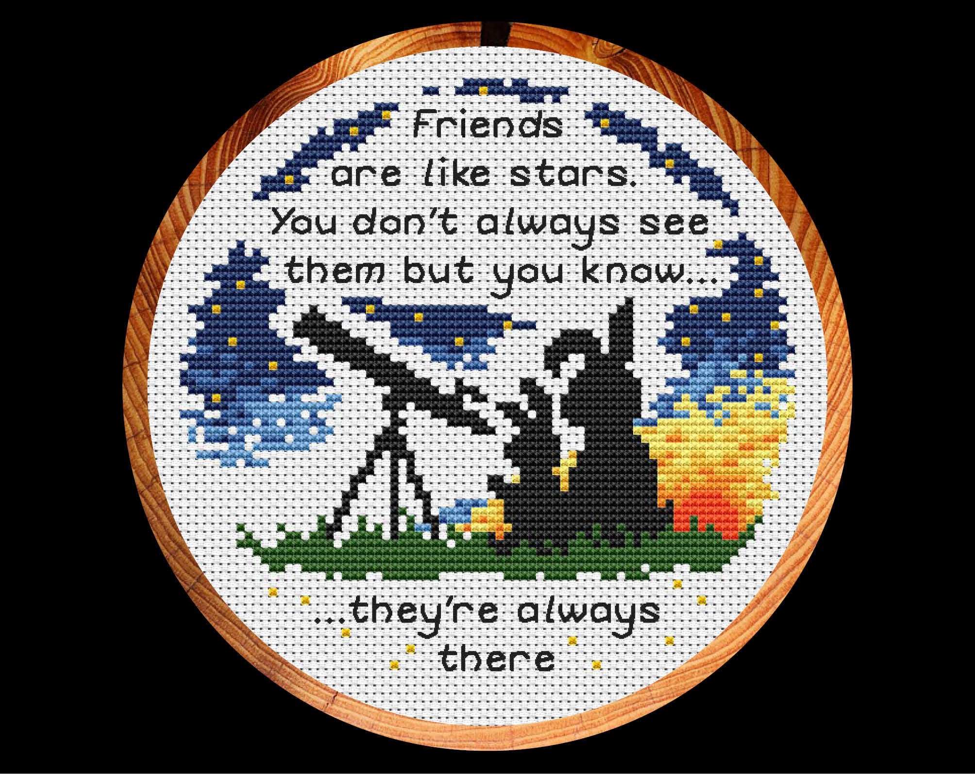 Cross stitch pattern of two bunnies looking through a telescope, with the words 'Friends are like stars. You don't always see them but you know they're always there." Shown in hoop.