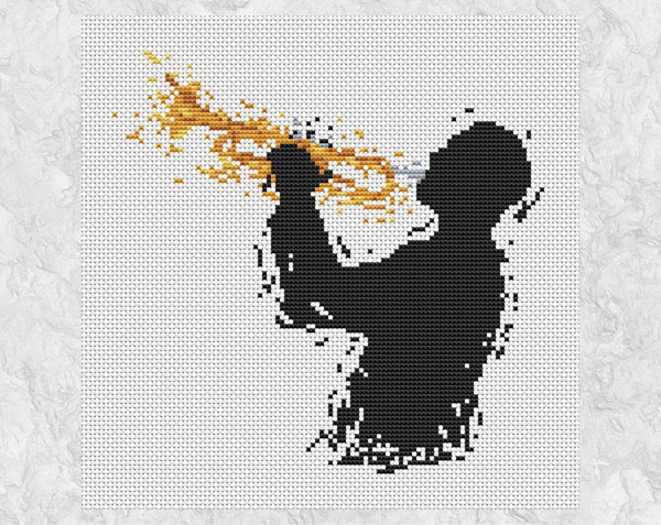 Modern art cross stitch pattern of a male trumpet player. Shown without frame.