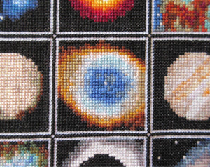 Array of different cross stitched astronomical images, including nebulae and planets, from the Wonders of Space Stitchalong
