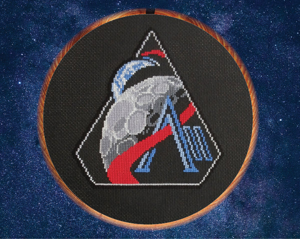 Artemis II Mission Patch cross stitch pattern. Shown in hoop.