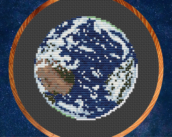 Hello, World from Artemis II mission. Cross stitch pattern of the Earth. Close up of image.