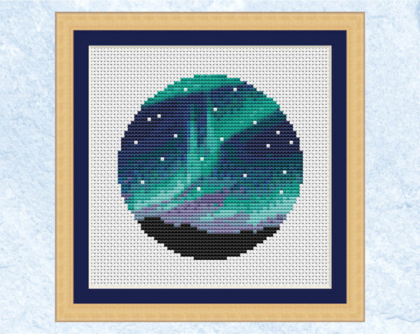 Aurora cross stitch pattern. Version without photographer silhouette. Shown in frame.