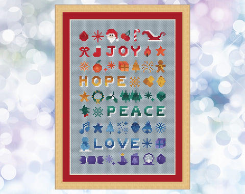 Christmas Rainbow Sampler cross stitch pattern. Shown in frame.