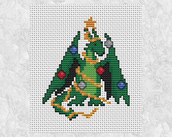 Christmas Tree Dragon cross stitch pattern. A small picture of a dragon dressed up as a Christmas Tree. Shown without frame.