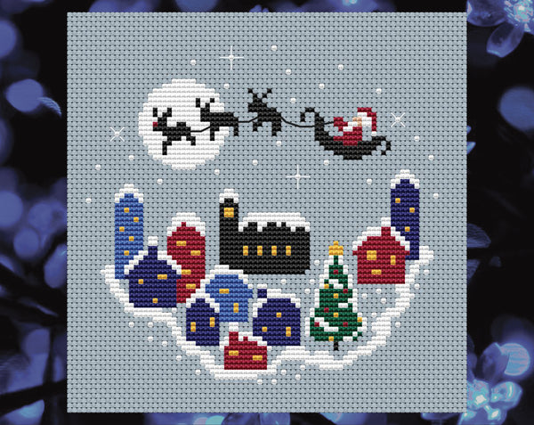 Christmas Village cross stitch pattern. Shown without frame.