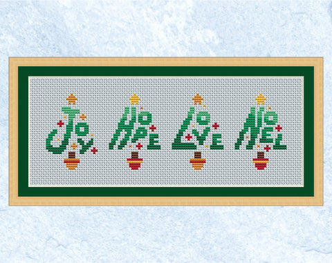 Christmas Words Christmas Trees cross stitch pattern. Four mini Christmas trees made up of the words JOY, HOPE, LOVE and NOEL. Shown in frame.