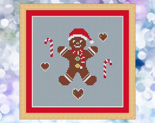 Gingerbread Man cross stitch pattern. Shown in frame.