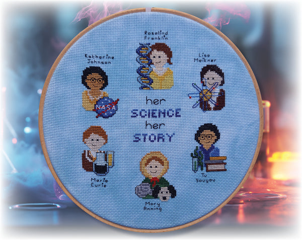 Her Science, Her Story: Women in Science cross stitch pattern. Six famous scientists stitched in a hoop: Katherine Johnson, Rosalind Franklin, Lise Meitner, Tu Youyou, Mary Anning and Marie Curie.