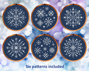 Lacy Snowflakes cross stitch patterns. Six sets of mini snowflakes made with cross stitch and backstitch.