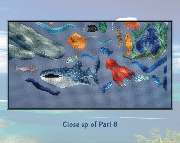 Ocean: Wonders of the Seas. A stitchalong by Climbing Goat Designs. Close up of Part 8, showing a whale shark, vampire squid and some smaller fish.