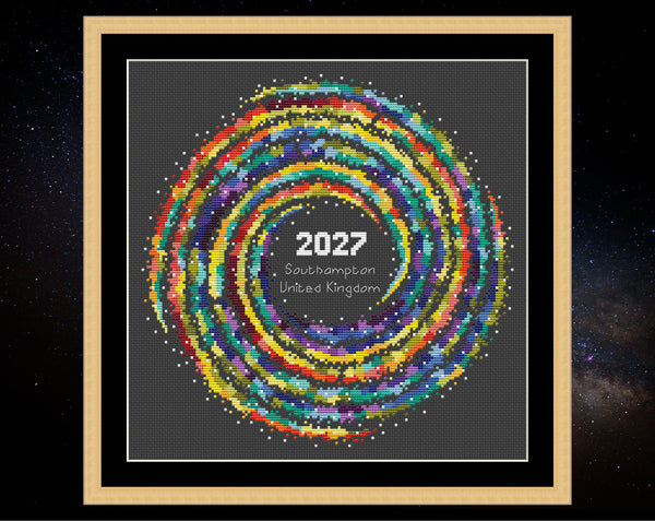 Rainbow Temperature Galaxy cross stitch pattern by Climbing Goat Designs - maximum and minimum temperatures version. Shown in frame on black fabric.