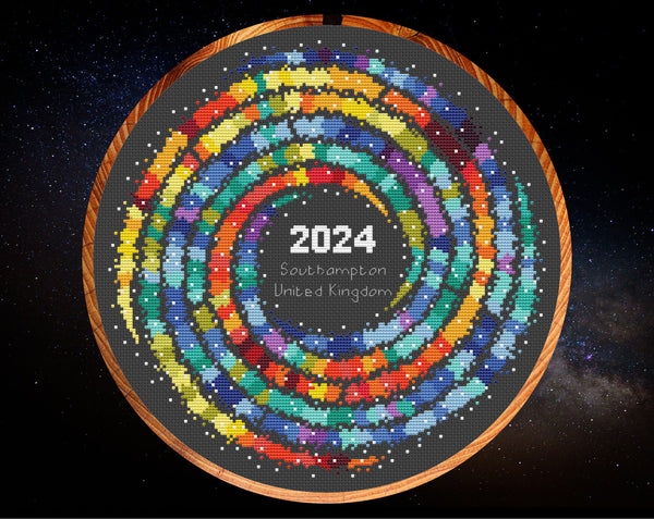 Rainbow Temperature Galaxy cross stitch pattern - example image for Southampton for 2024, shown on black fabric in 11 inch hoop
