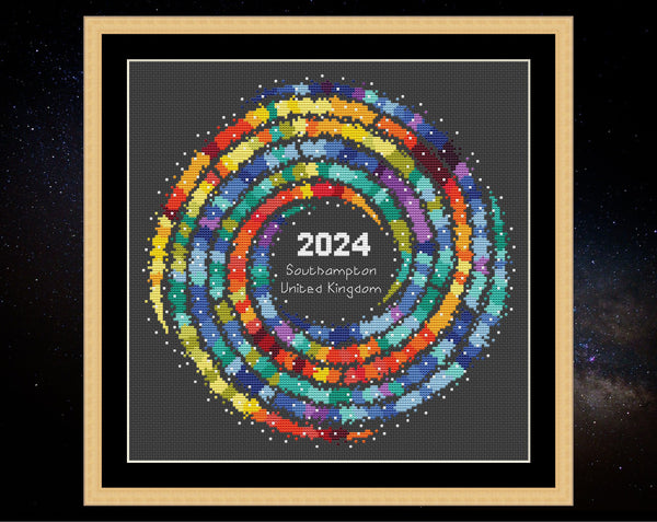 Rainbow Temperature Galaxy cross stitch pattern - example image for Southampton for 2024, shown on black fabric in square frame
