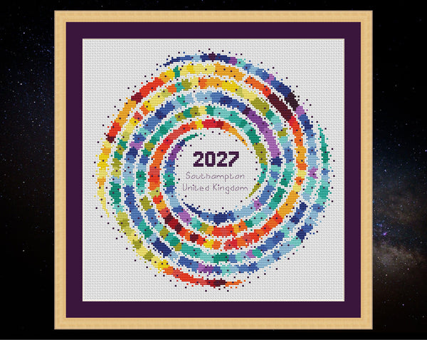 Rainbow Temperature Galaxy by Climbing Goat Designs - maximum temperatures version. Shown in frame on white fabric.