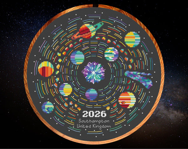 Rainbow Temperature Solar System cross stitch pattern. Shown in 11 inch hoop on black fabric.