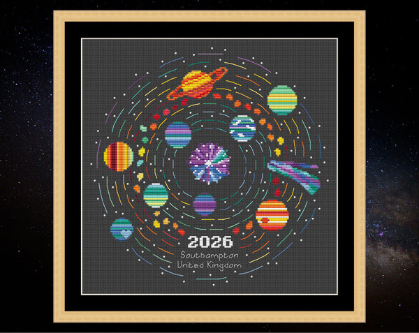 Rainbow Temperature Solar System cross stitch pattern. Shown in frame on black fabric.