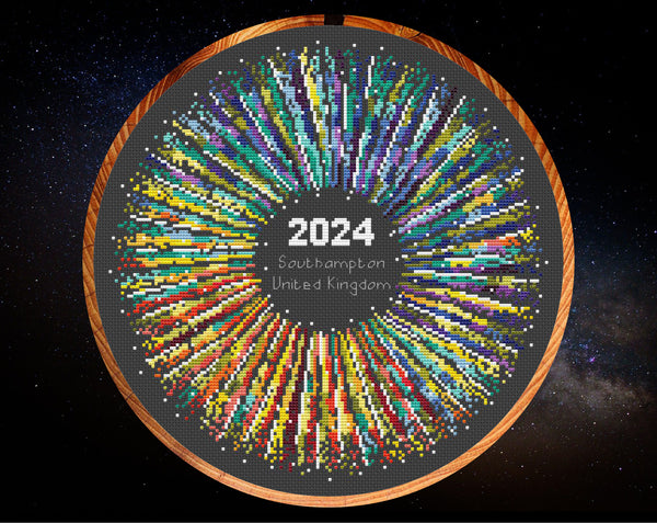 Rainbow Temperature Supernova cross stitch pattern - maximum and minimum temperatures version. Shown in hoop.
