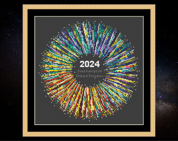 Rainbow Temperature Supernova cross stitch pattern - maximum and minimum temperatures version. Shown in frame on dark fabric.