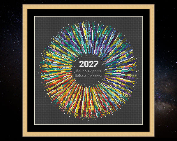 Rainbow Temperature Supernova cross stitch pattern by Climbing Goat Designs - maximum and minimum temperatures version. Shown in frame on black fabric.