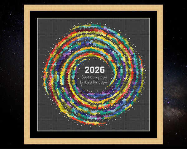 Rainbow Temperature Galaxy cross stitch pattern - example image for Southampton for 2025, shown on black fabric in square frame. Maximum and minimum temperatures pattern version.