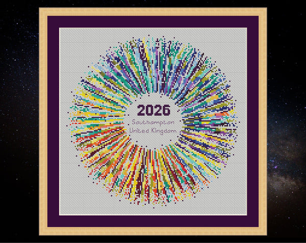 Rainbow Temperature Supernova cross stitch pattern - maximum and minimum temperatures version. Shown in frame on pale fabric.