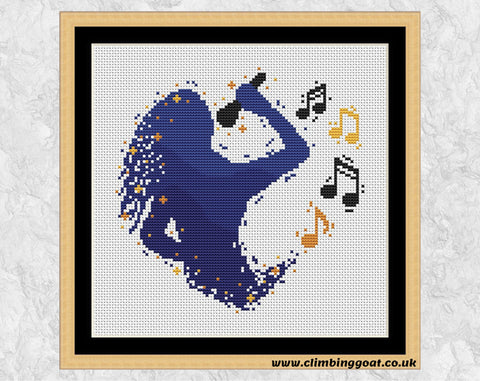 Singing Heart cross stitch pattern. Silhouette of a singer and microphone making a heart shape with musical notes. Shown in frame.