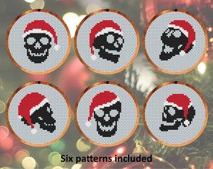 Skulls in Christmas Hats cross stitch pattern. Six patterns included.