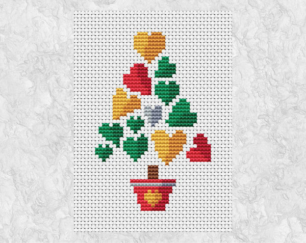Smaller Hearts Christmas Tree cross stitch pattern. Shown without frame.
