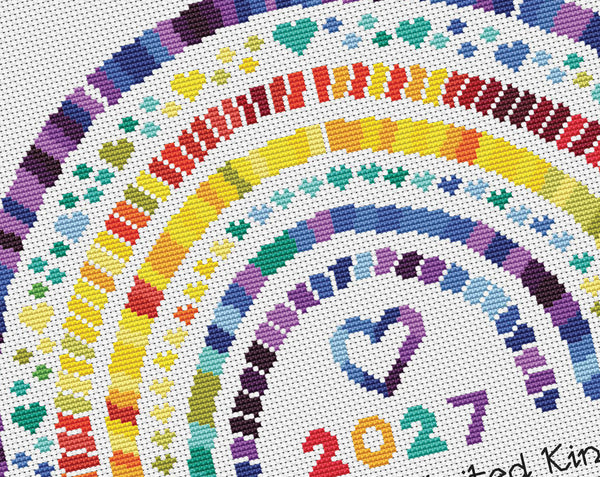 Temperature Rainbow cross stitch pattern by Climbing Goat Designs - maximum temperatures version. Close up of design on white faric.