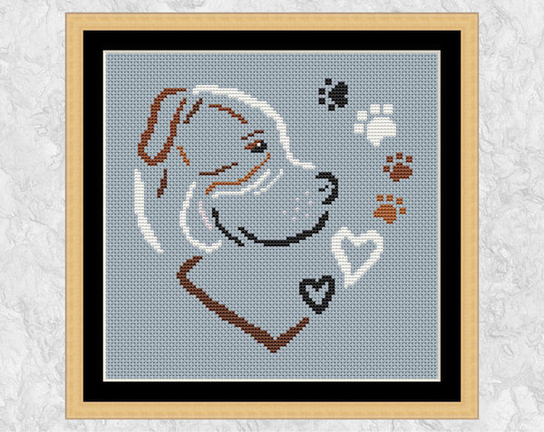 American Bulldog Heart cross stitch pattern. Shown with frame.