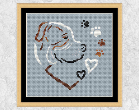 American Bulldog Heart cross stitch pattern. Shown with frame.